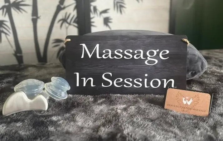 Inviting table for massage with cups and business cards 